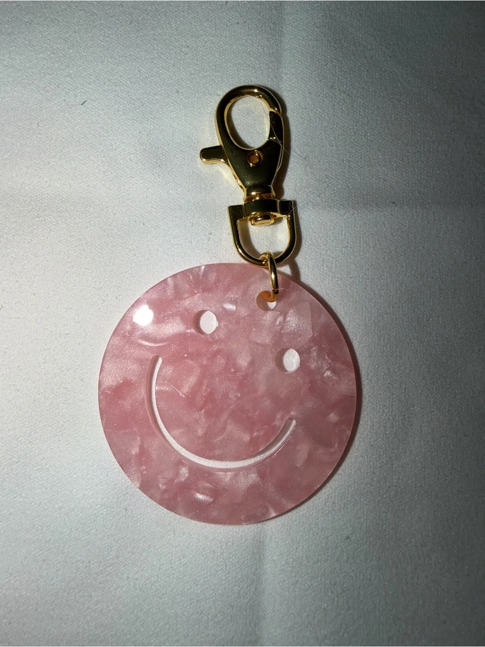 Pink Smiley Face Acrylic Keychain with Gold Clip